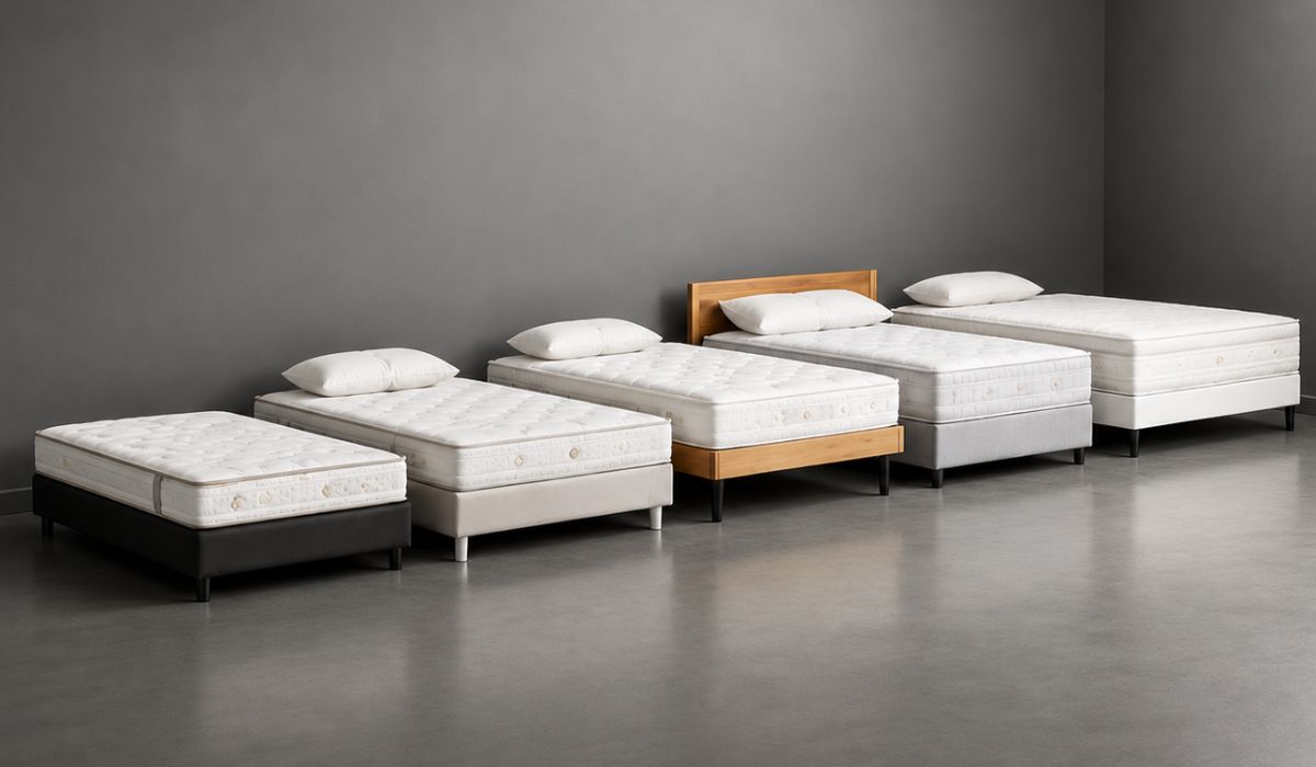 Diferentes tipos de cama box com colchões alinhados, ilustrando a diferença entre modelos, tamanhos e bases para o quarto