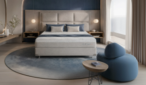 Quarto sofisticado com colchão em destaque, decoração elegante e paleta de cores equilibrada, representando a importância da cor do quarto no conforto do ambiente